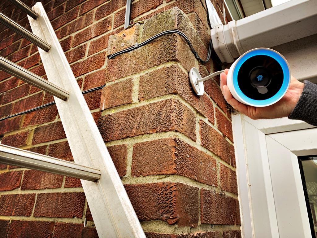 close-up-view-of-a-homeowner-installing-a-google-n